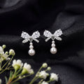 Korean Delicate Silver Pave Bow Earrings : YUFSER263