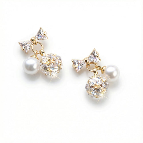 Gilded Pearl Bow Stud Earrings.