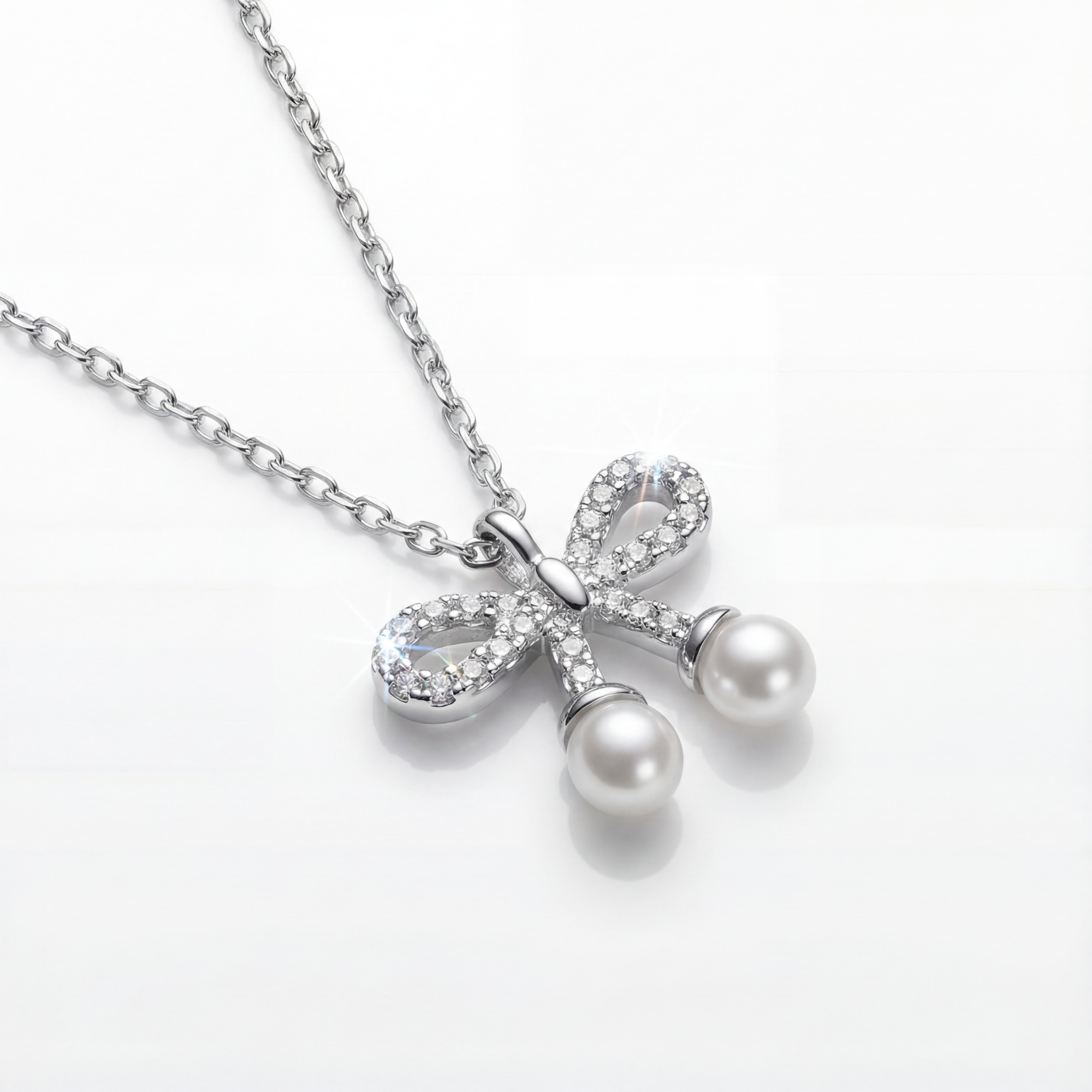 Sparkle Studded bow with Pearl Drop