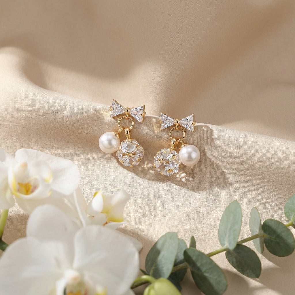 Korean Gilded Pearl Bow Stud Earrings. : YUFSER216